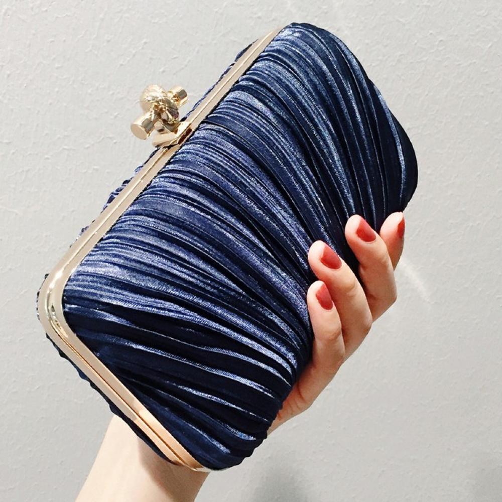 navy blue and gold clutch