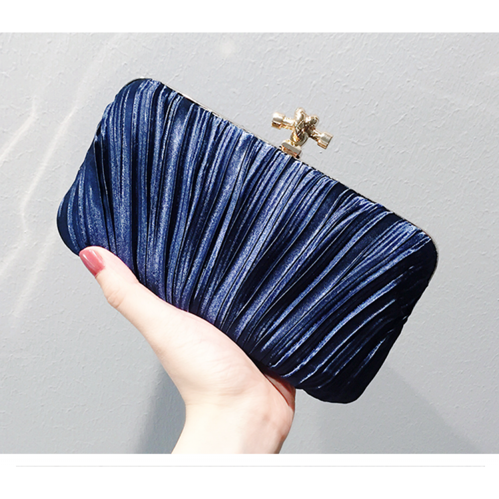 navy blue and gold clutch